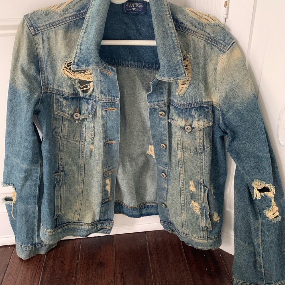 Distressed denim jacket